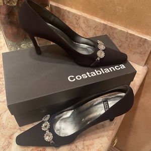 Costa Blanca Black Jester Prada Clasp Heels